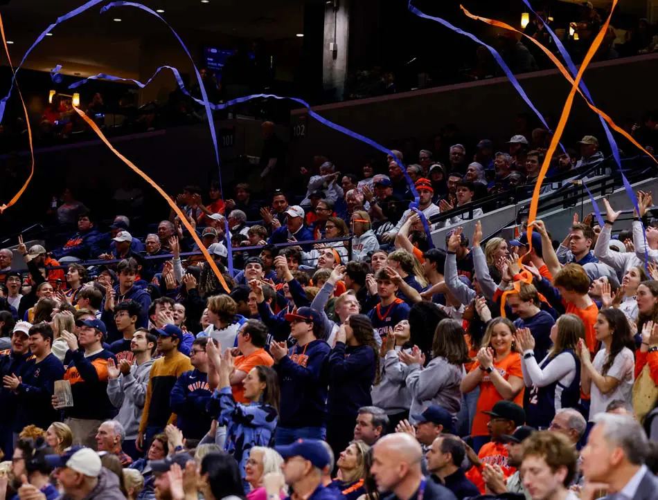 Fans cheering at a game