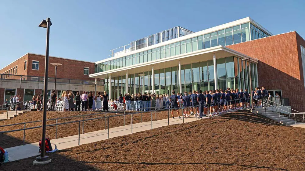 People gathered outside of facility