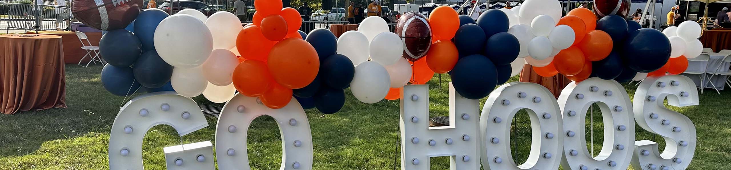 Go Hoos sign with balloons