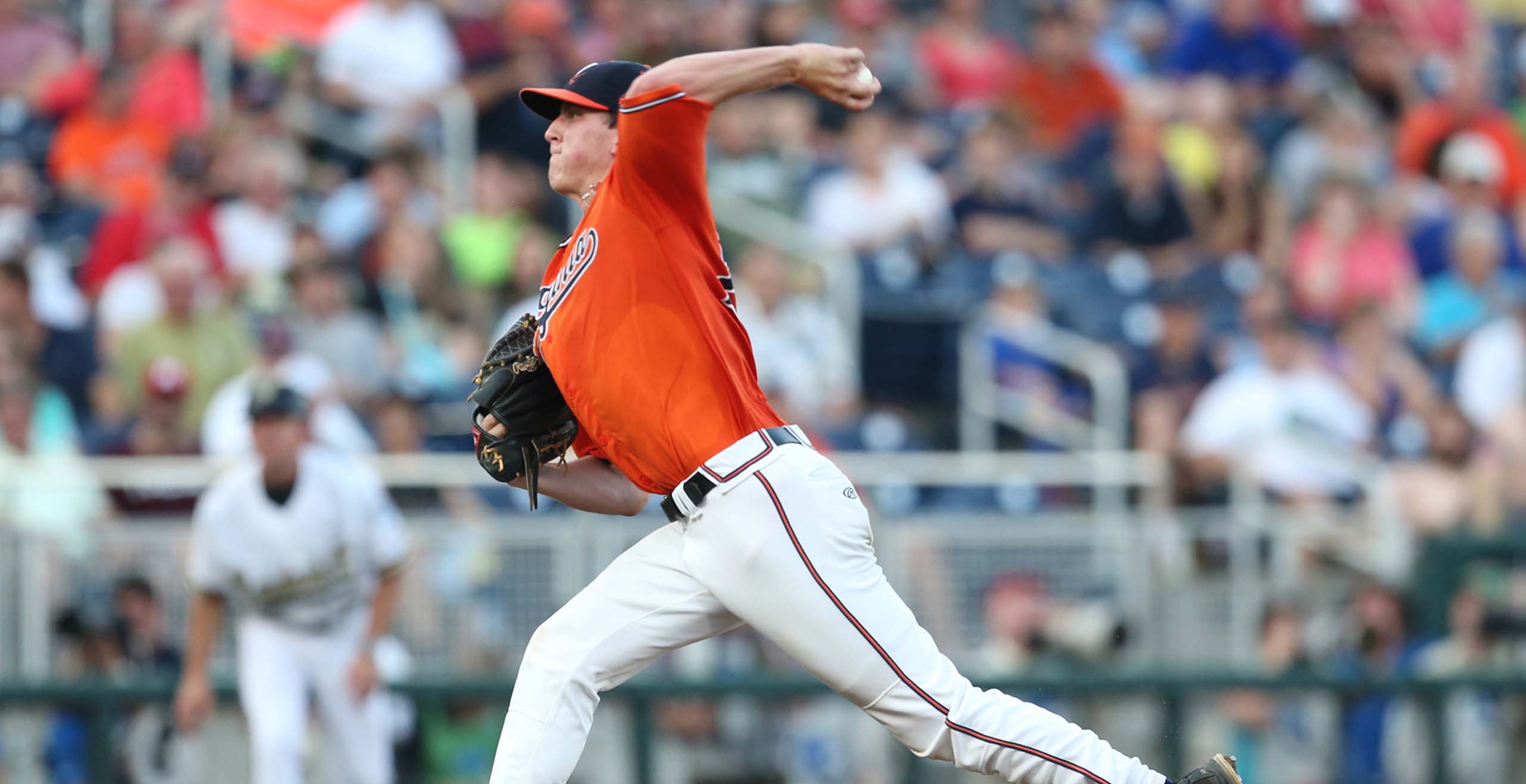 Baseball player throwing a pitch